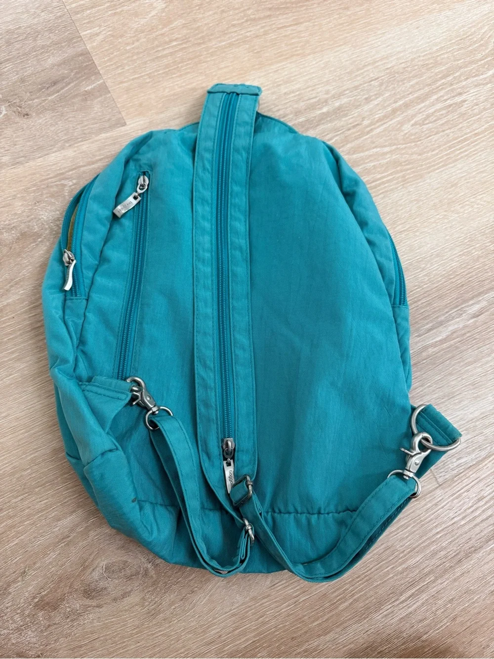Baggallini Excursion Sling Rare Teal Color Convertible Crossbody to Backpack